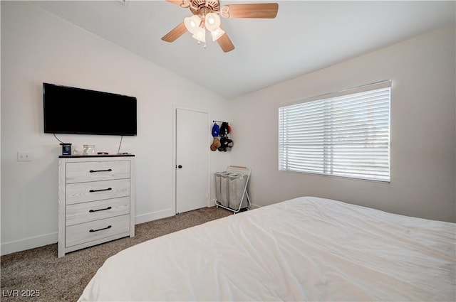 bedroom with ceiling fan, light carpet, and vaulted ceiling