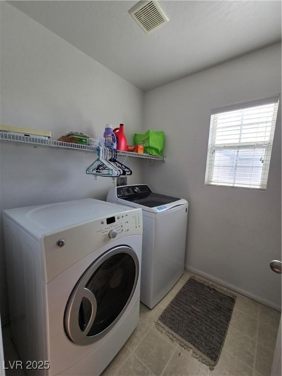 laundry room featuring washer and dryer