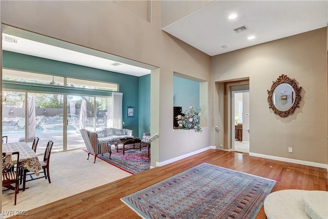 foyer with wood-type flooring