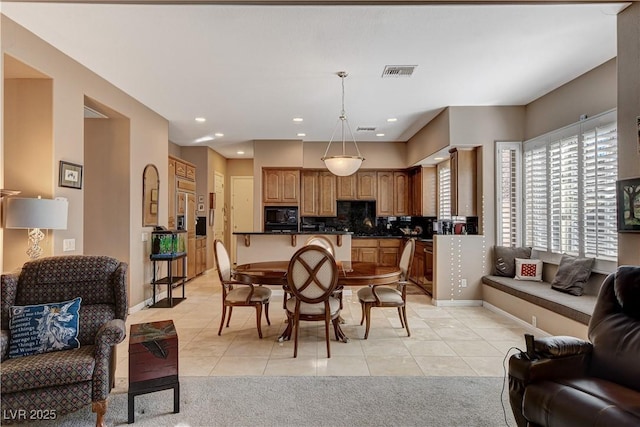 view of tiled dining space