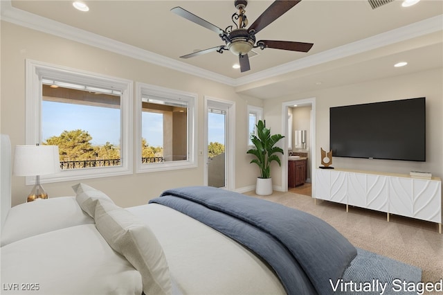 bedroom featuring ceiling fan, ornamental molding, and connected bathroom