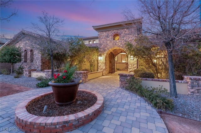 view of front of property with a patio