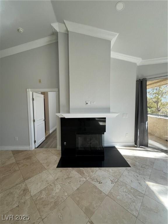 unfurnished living room with baseboards, high vaulted ceiling, a glass covered fireplace, and crown molding