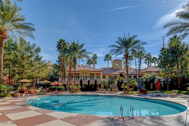 pool featuring a patio area