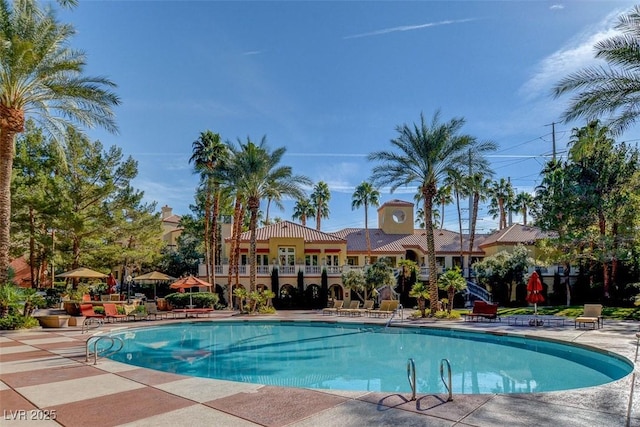 pool featuring a patio area