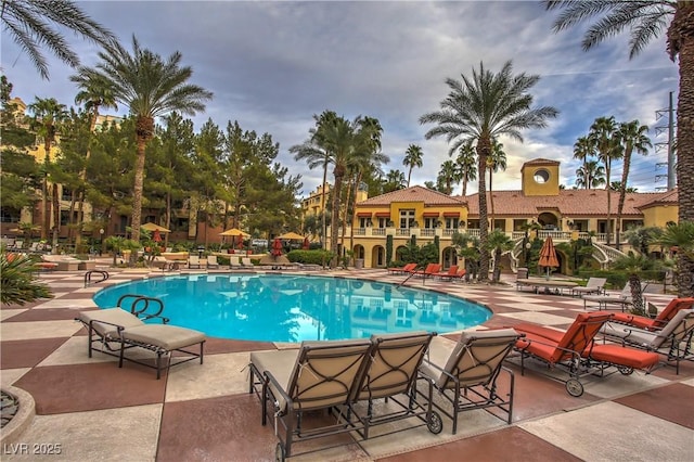 community pool featuring a patio area