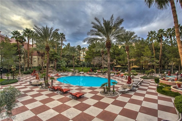 pool with a patio area