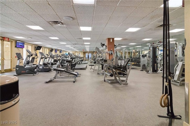 gym featuring a drop ceiling and visible vents