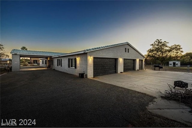 view of front of home with a garage