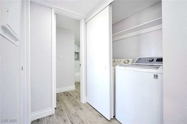 1701 E Katie Ave Unit 10, Las Vegas, NV 89119 - washroom featuring washer / clothes dryer and light hardwood / wood-style floors