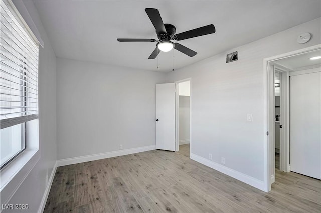 1701 E Katie Ave Unit 10, Las Vegas, NV 89119 - unfurnished room featuring light hardwood / wood-style floors, a wealth of natural light, and ceiling fan