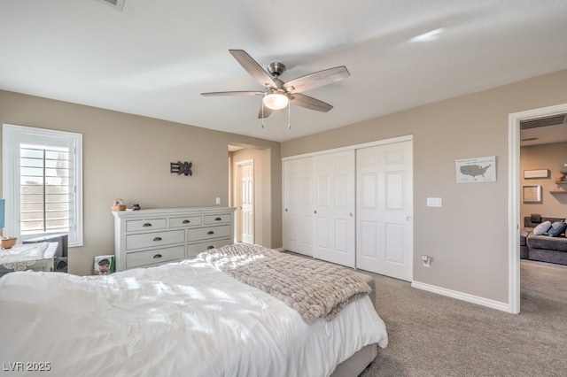 bedroom with ceiling fan, a closet, and carpet floors