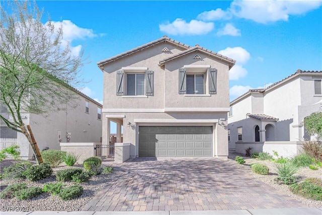 view of front of home with a garage