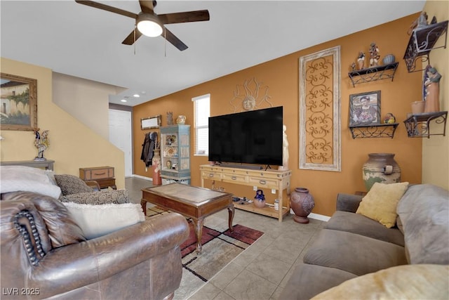 living room with ceiling fan and light tile patterned floors