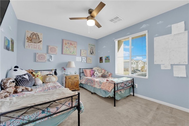 bedroom featuring ceiling fan and light colored carpet