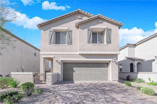 view of front of property with a garage