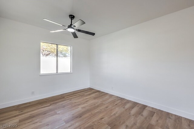 spare room with light wood-type flooring