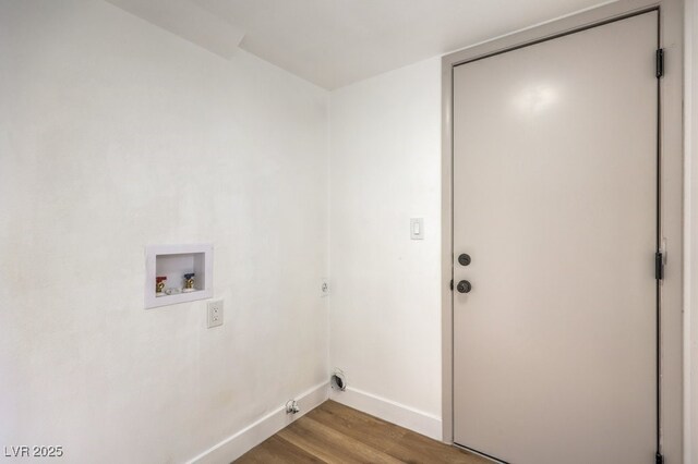 clothes washing area featuring washer hookup, hardwood / wood-style floors, and gas dryer hookup