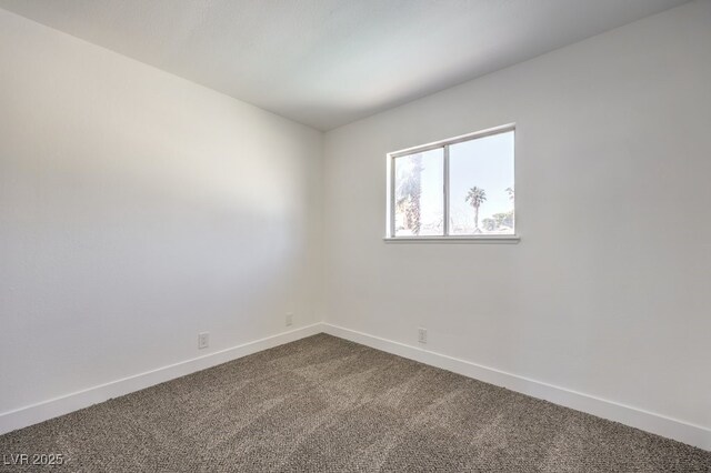 spare room featuring carpet flooring