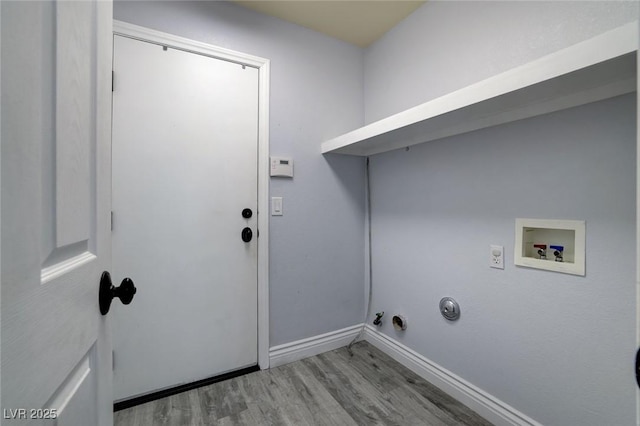 laundry area with washer hookup, light wood-type flooring, and gas dryer hookup