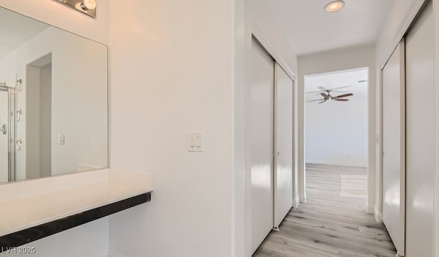 hallway featuring light hardwood / wood-style floors