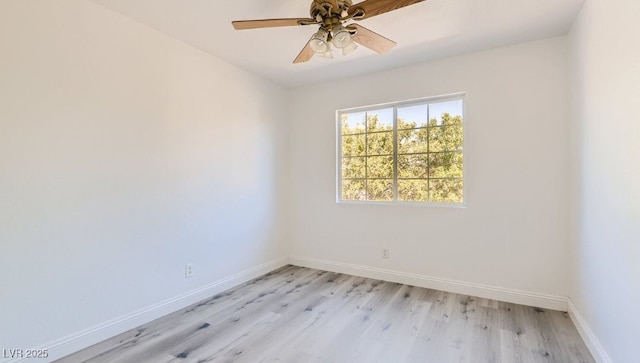 empty room with ceiling fan and light wood-type flooring