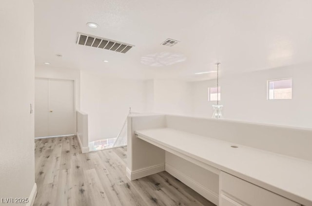 bathroom featuring hardwood / wood-style flooring