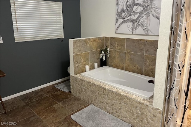 bathroom featuring tiled bath