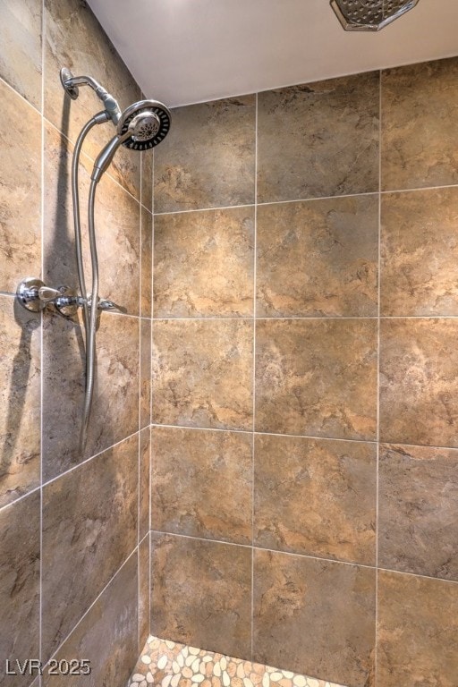 details featuring a tile shower