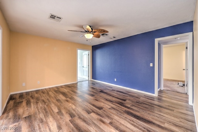 unfurnished room featuring ceiling fan and hardwood / wood-style floors