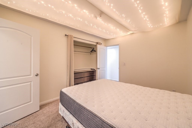 bedroom featuring light colored carpet