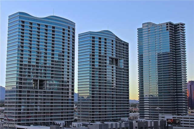 view of outdoor building at dusk