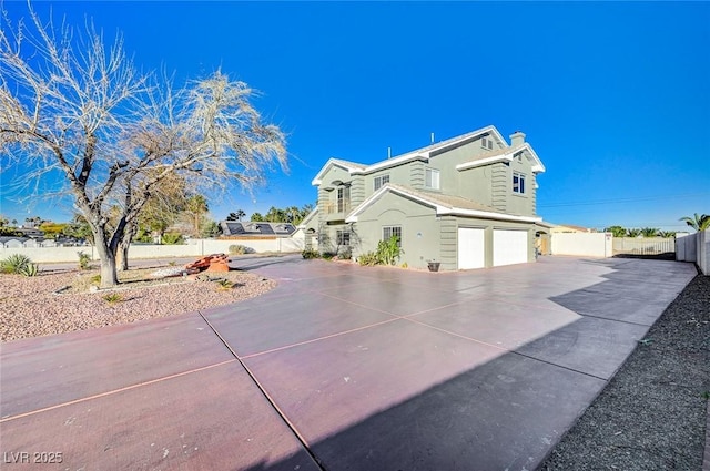 view of side of property featuring a garage