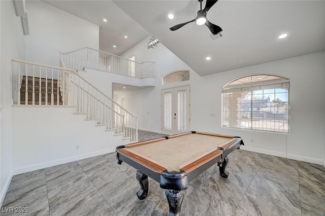 playroom with a high ceiling, french doors, ceiling fan, and billiards