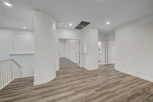 unfurnished room featuring light wood-type flooring