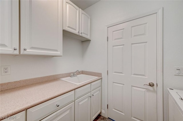 kitchen with sink and white cabinets