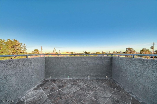 view of patio with a balcony