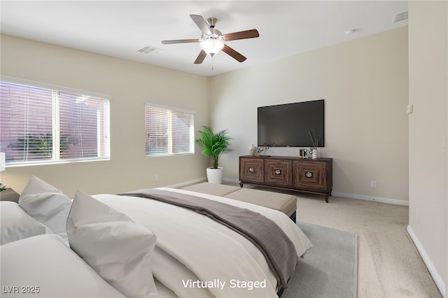 carpeted bedroom with ceiling fan