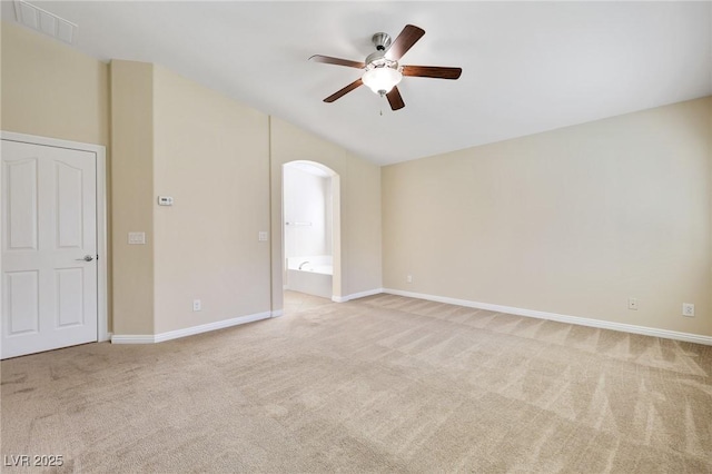 empty room with light colored carpet and ceiling fan