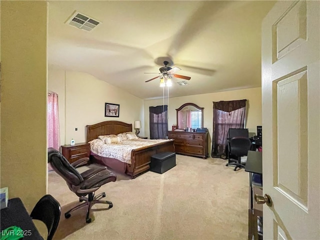 bedroom featuring light carpet, lofted ceiling, and ceiling fan