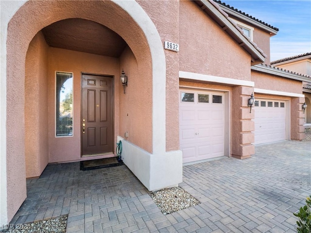 entrance to property with a garage