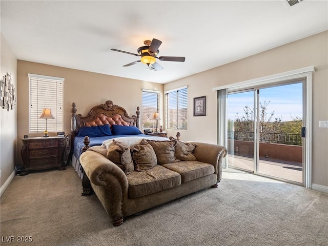 carpeted bedroom featuring ceiling fan and access to exterior