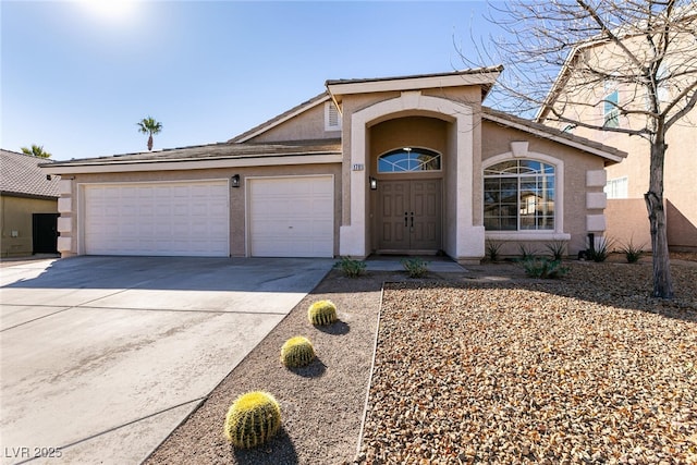 view of front of home with a garage