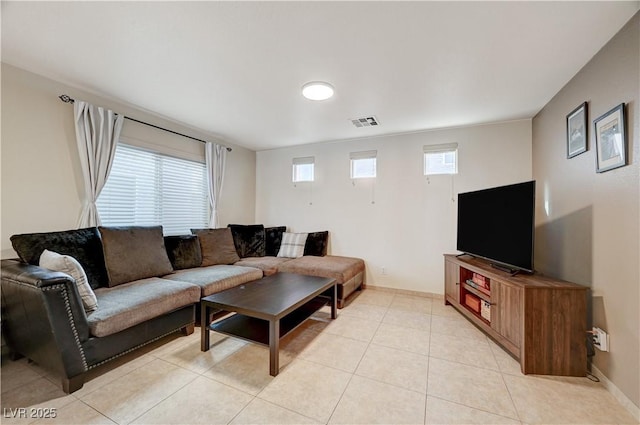 living room with light tile patterned floors