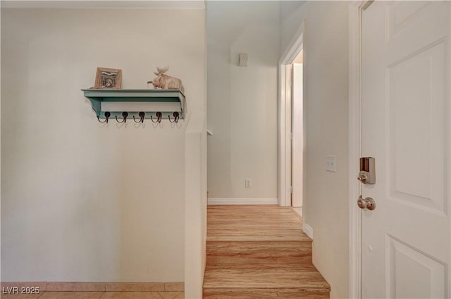 hall with light hardwood / wood-style floors