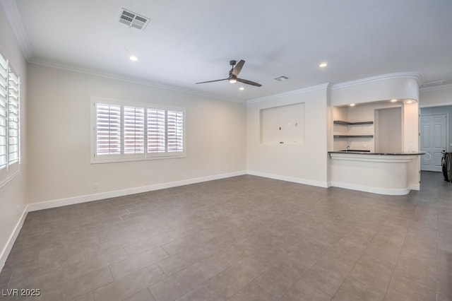 unfurnished living room with crown molding, ceiling fan, and a healthy amount of sunlight