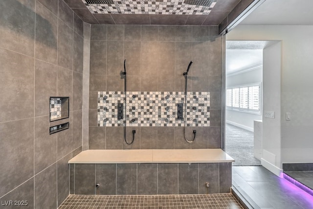 bathroom with tiled shower