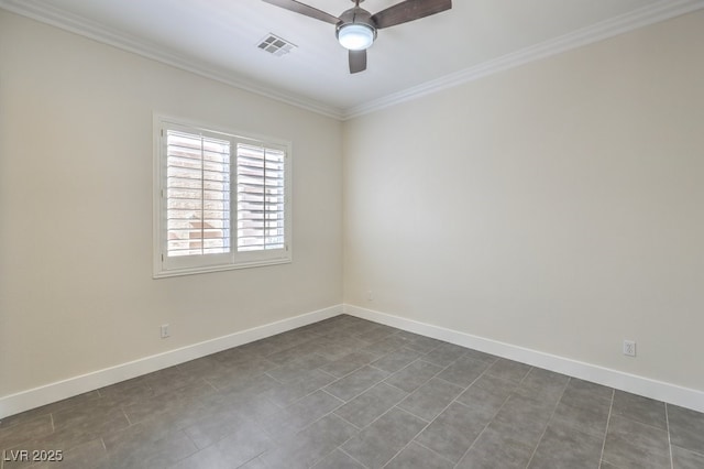 empty room featuring dark tile patterned floors, ceiling fan, and crown molding