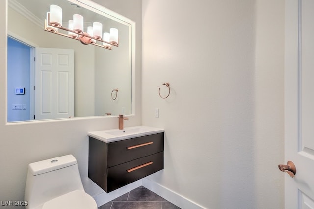 bathroom featuring tile patterned floors, toilet, vanity, and ornamental molding