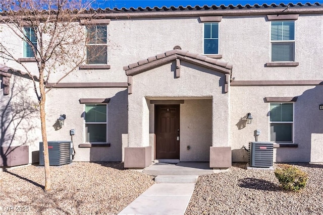 view of front of property with central AC unit